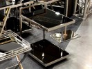 NOELLE - SOFF/SIDOBORD I SVART TEMPERERAT GLAS M. HJUL