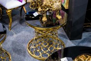 Black table with oriental gold base